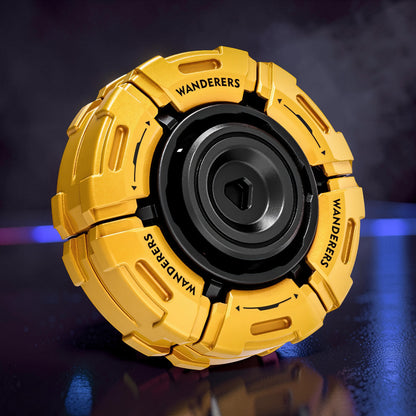 The Curious Mind Bumblebee Metal Spinner in gold with black accents. Features 'WANDERERS' text and a central bearing.