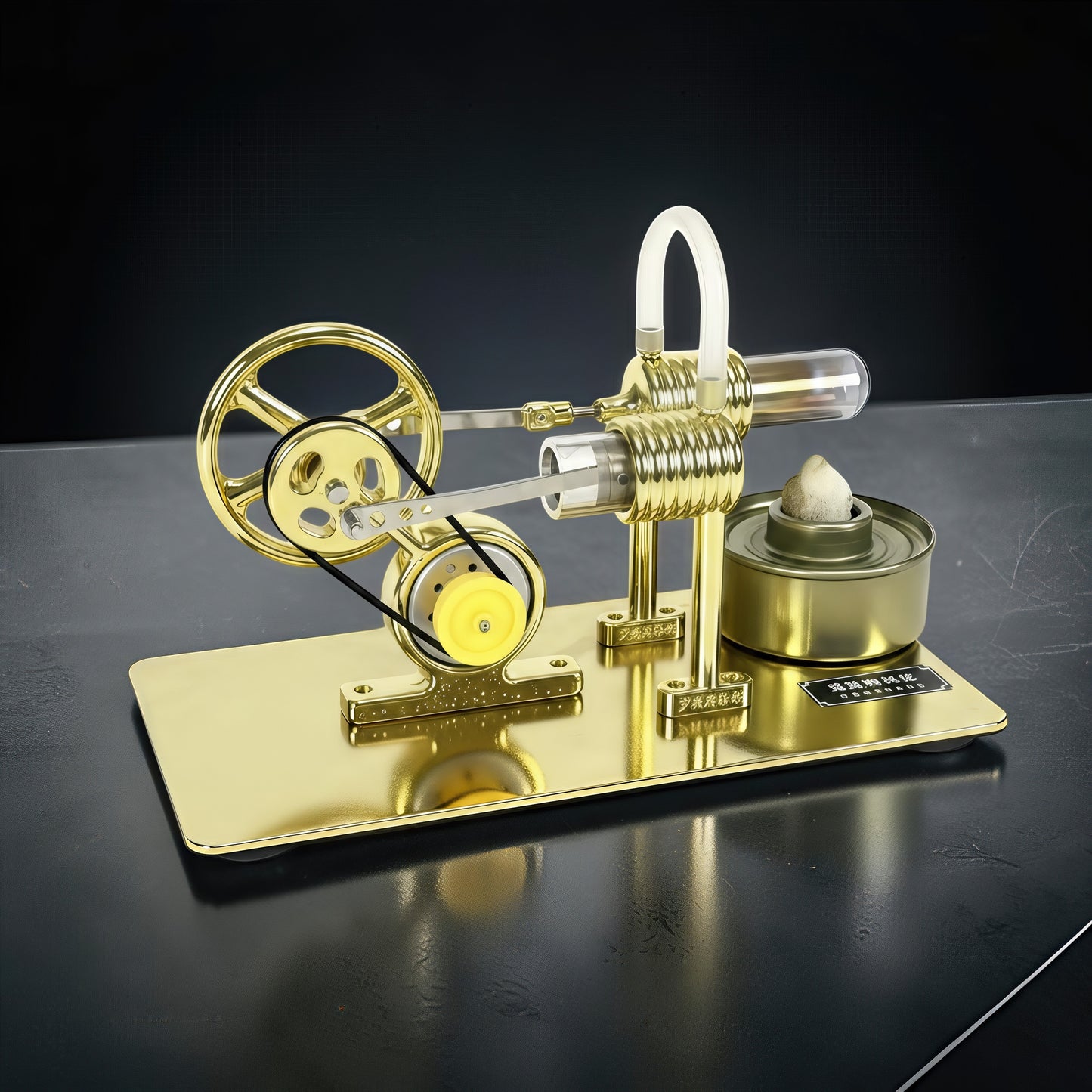 The Curious Mind Classic Stirling Engine DIY Kit, a polished gold metal model with a flywheel, belt, and heat source.