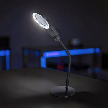 The Curious Mind Gooseneck LED magnifier desk lamp with adjustable neck for detailed hobby work.
