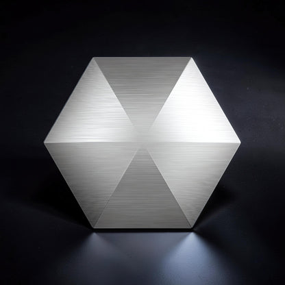 The Curious Mind Flipo Flip Hexagon kinetic desk spinner is a premium, weighted metal toy with a brushed silver finish, designed for focus and stress relief.