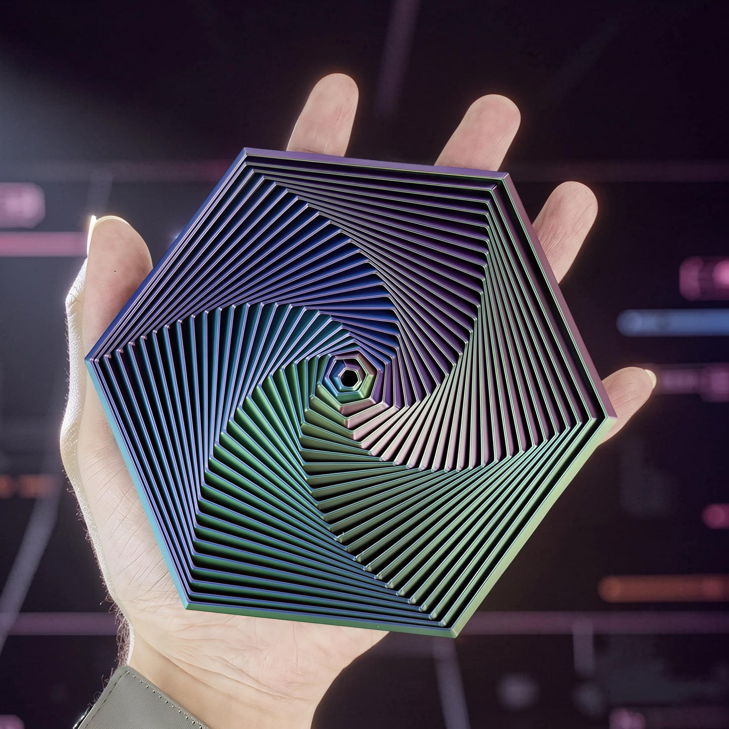 The Curious Mind Hexagon Push Fidget sensory toy with iridescent finish, held in a hand.
