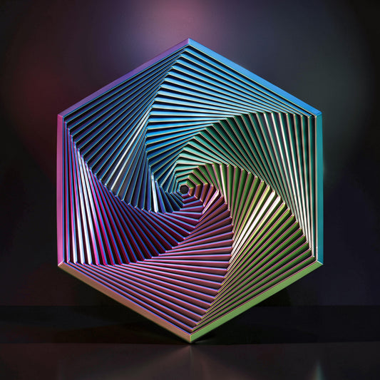 The Curious Mind Hexagon Push Fidget sensory toy with iridescent metallic finish, offering tactile feedback and stress relief.