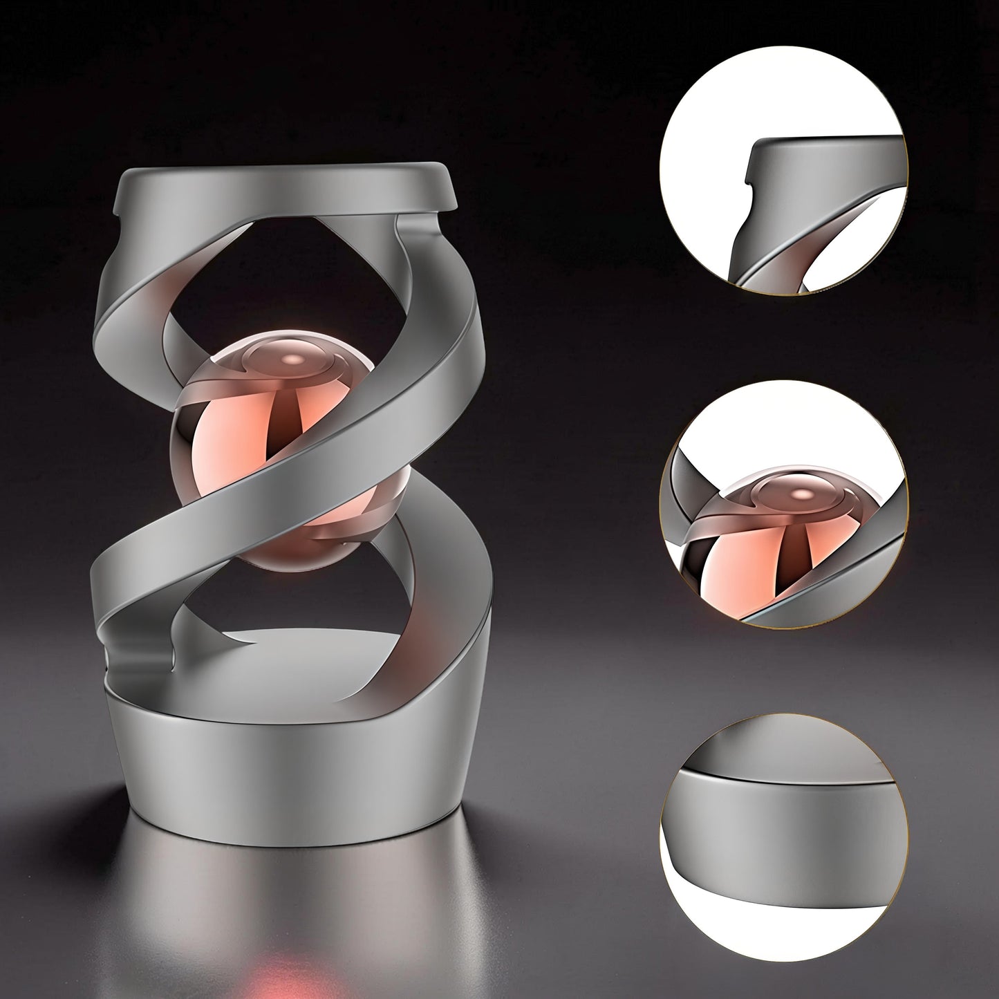 The Curious Mind Hypnosis Rotary Desk Spinner, a metallic grey abstract sculpture with a rose gold sphere inside, designed for focus and stress relief.