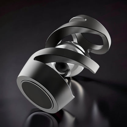 The Curious Mind Hypnosis Rotary Desk Spinner, a weighted metal desk toy with a hypnotic swirling design and a polished silver sphere at its core.