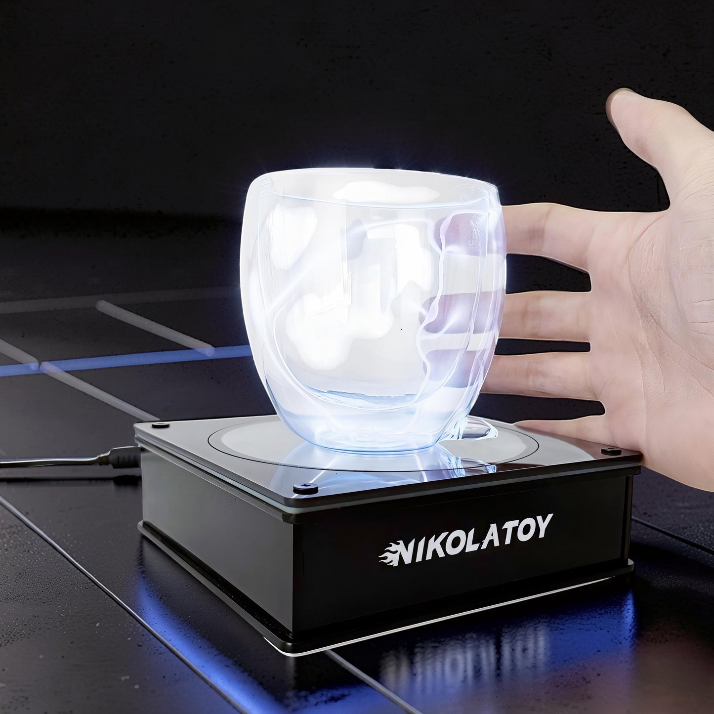The Curious Mind Inert Gas Lightning Cup with Display Base, a glass cup with glowing blue plasma inside, shown on a black display base.