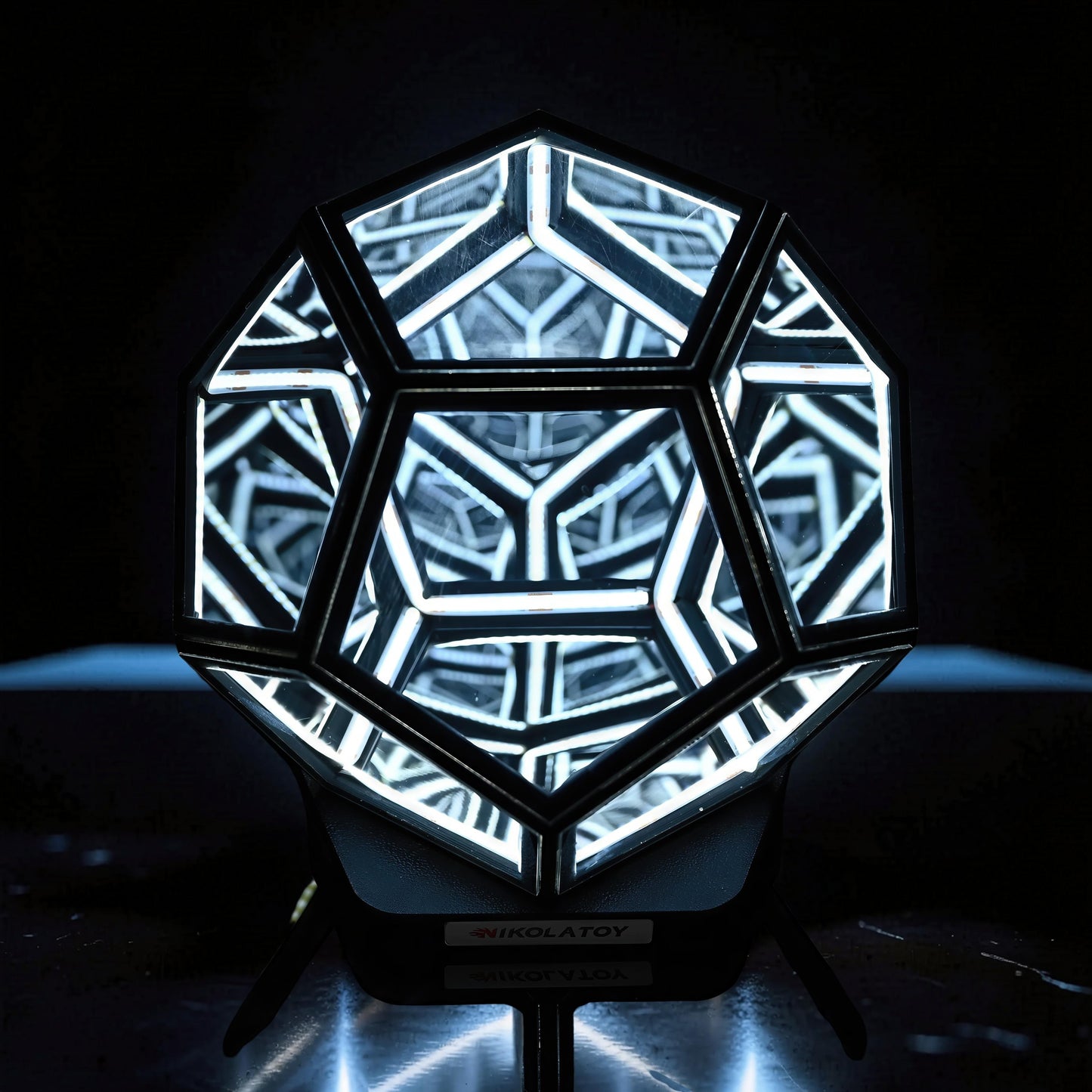 The Curious Mind Infinite Space Abyss Dodecahedron LED Night Light with internal geometric reflections, made of PLA.