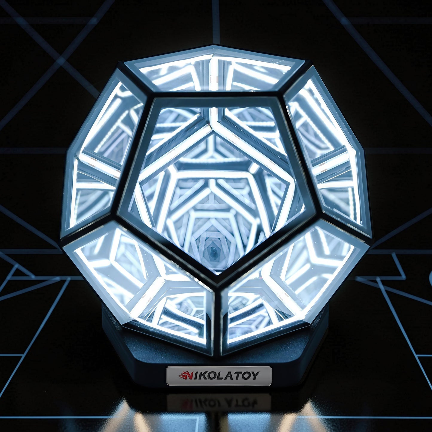 The Curious Mind Infinite Space Abyss Dodecahedron LED Night Light with white glowing geometric patterns.