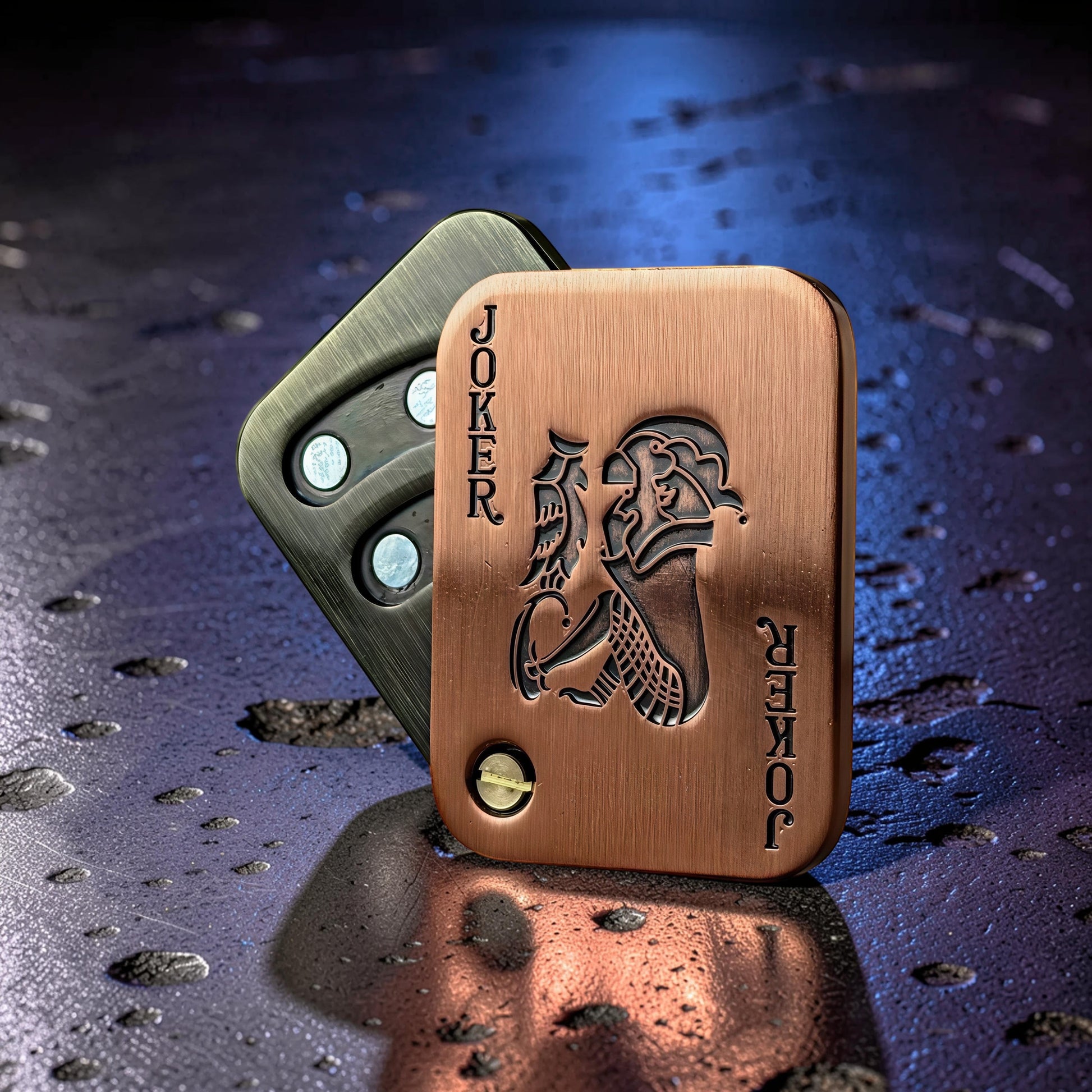 The Curious Mind Joker Poker magnetic slider fidget toy in copper and dark metal finishes with Joker card design.