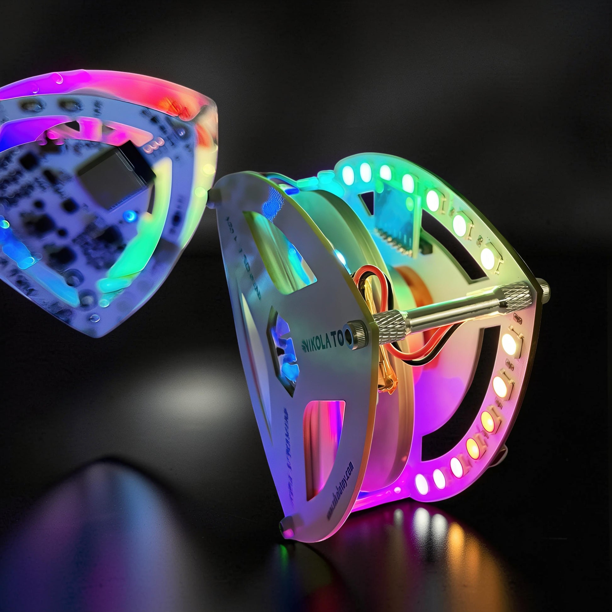The Curious Mind Self-Balancing Lelo Triangle Kinetic Desk Toy with RGB LED lights, a modern desk accent.