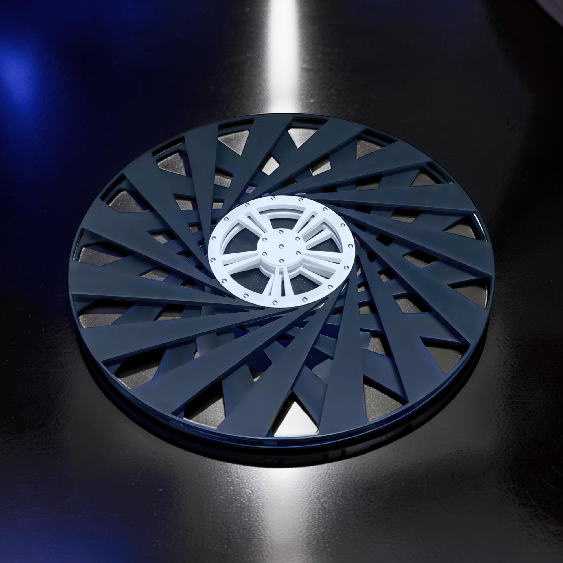 The Curious Mind Time Travel Edition desktop ornament, a dark grey PLA kinetic sculpture with a white central wheel.
