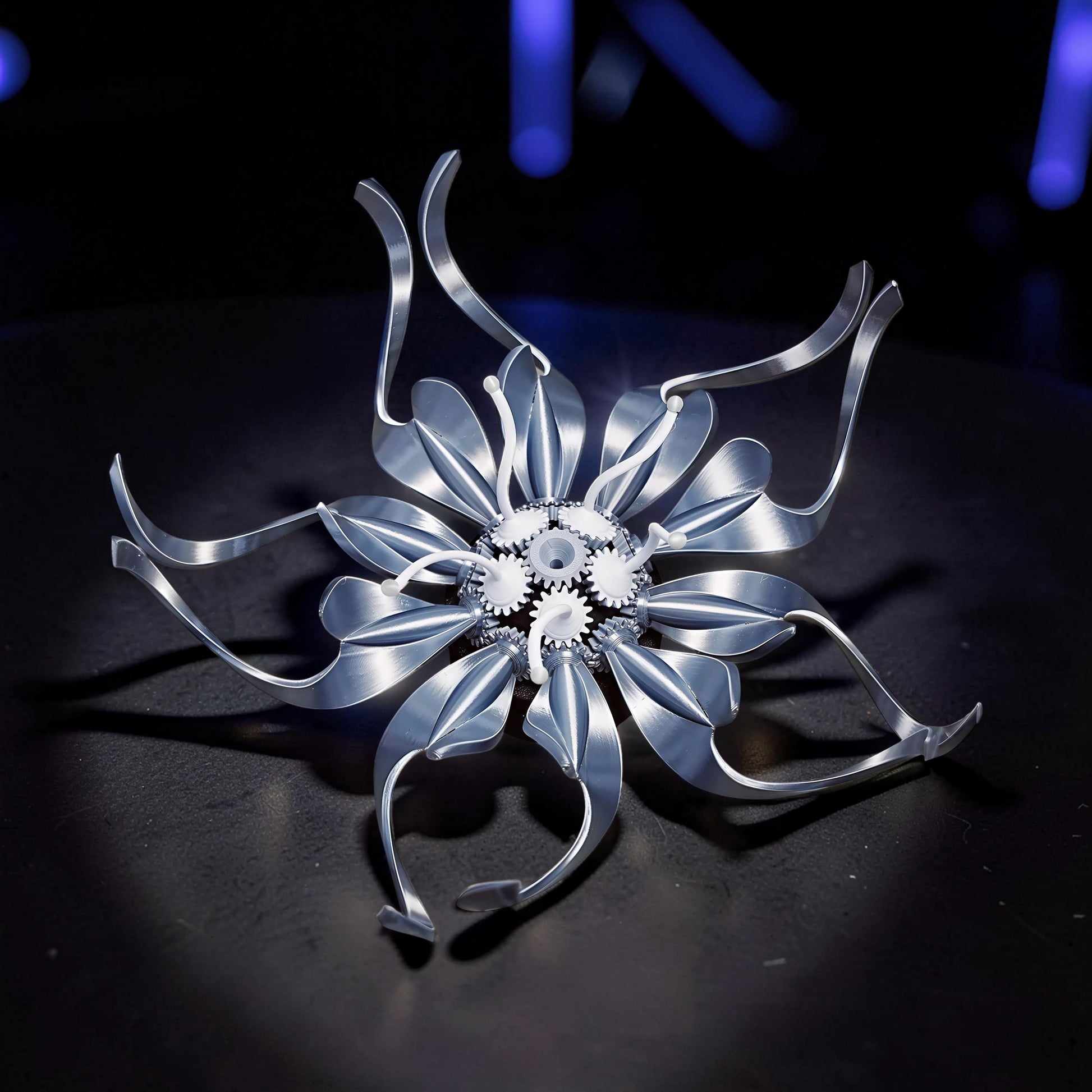 The Curious Mind Mechanical Kinetic Flowers Sculpture Gallery Edition, silver PLA, intricate gears, desktop art.