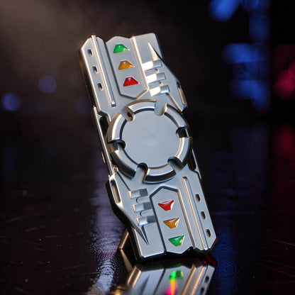 The Curious Mind Laser Cannon Glow Spinner, a futuristic metal fidget spinner with red, yellow, and green light-up accents.