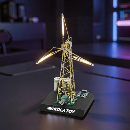 The Curious Mind LED Windmill Night Light with gold-tone frame and warm glowing blades on a black base.