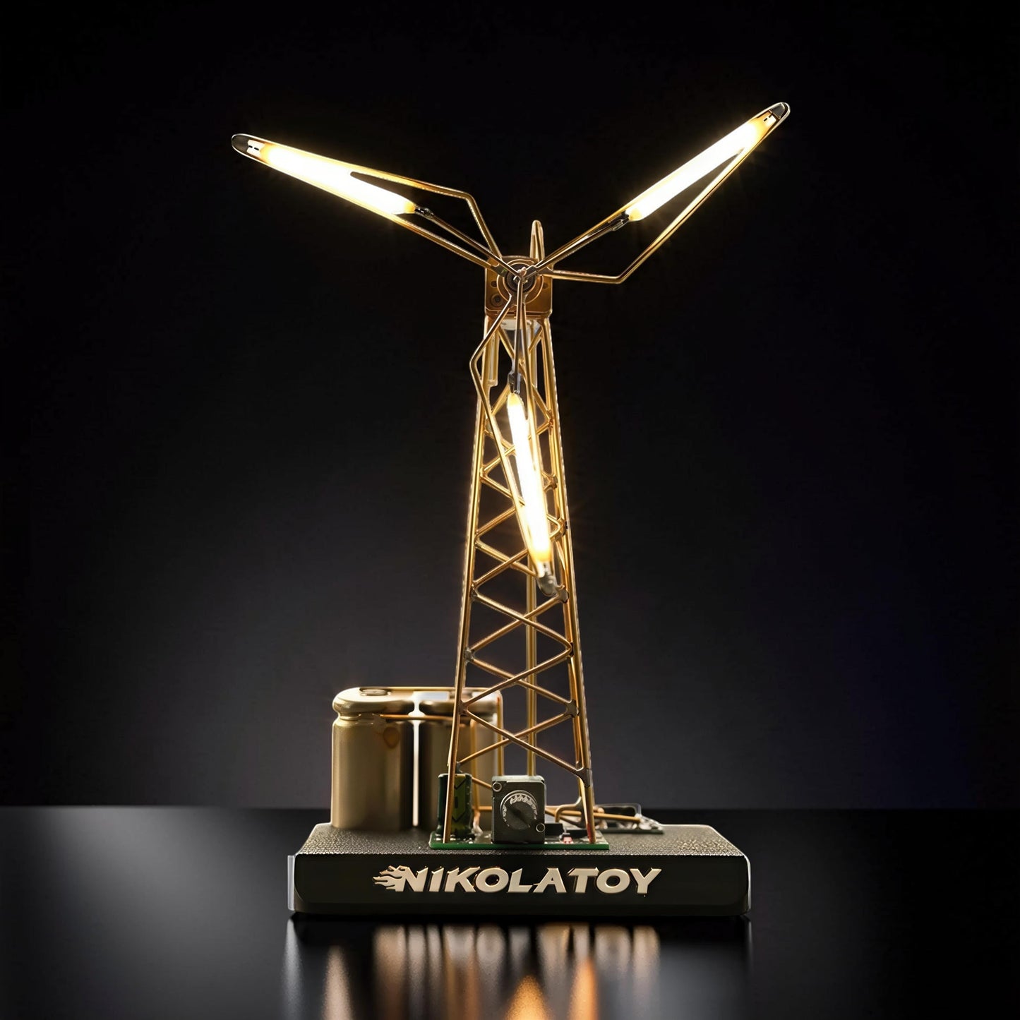 The Curious Mind LED Windmill Night Light, a DIY metal desk lamp with a gold-tone frame and warm yellow LED lights.