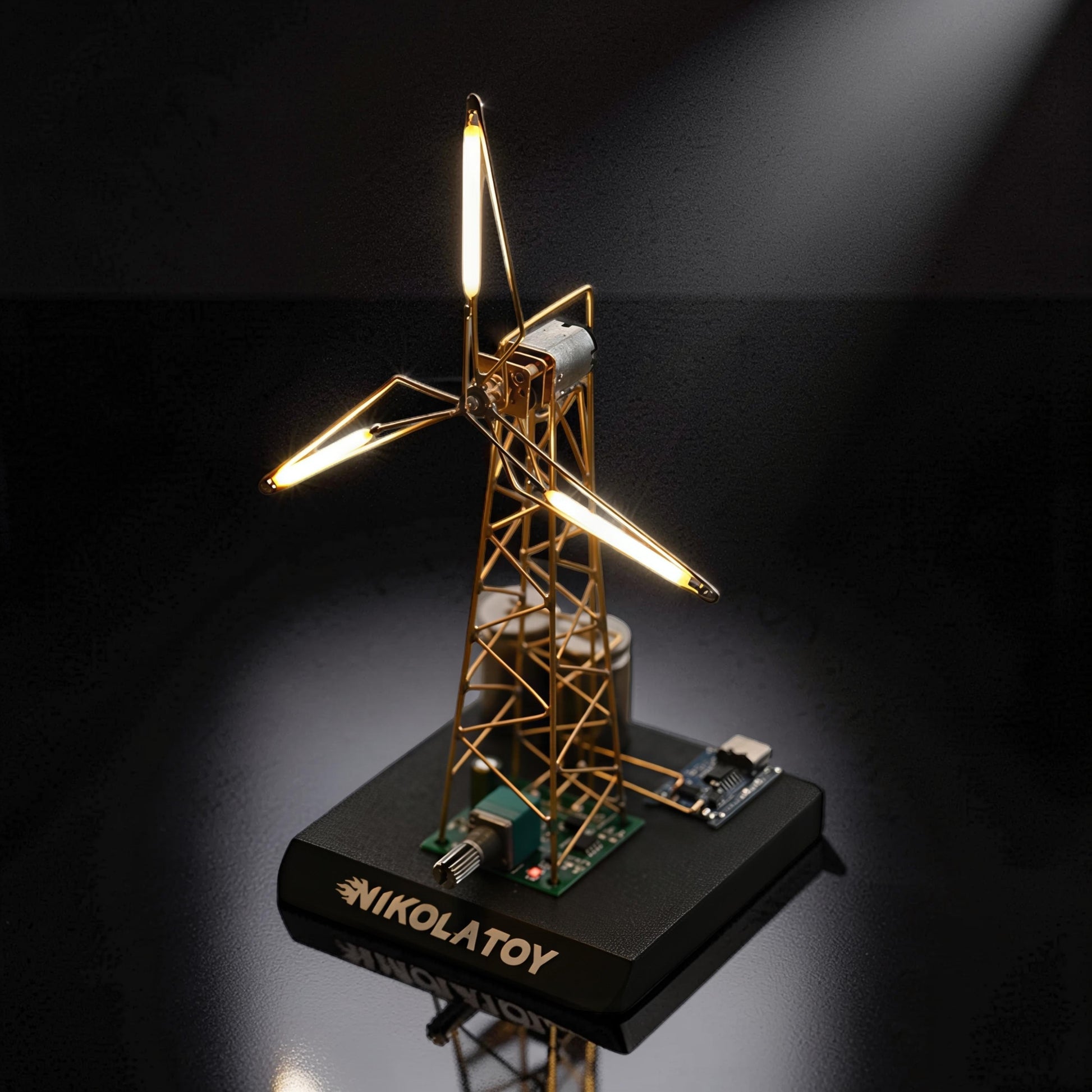 The Curious Mind LED Windmill Night Light, a DIY metal desk lamp with illuminated blades and electronic components.