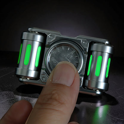 The Curious Mind Luminous Tank Metal Spinner with green glowing tubes and a silver metallic finish.