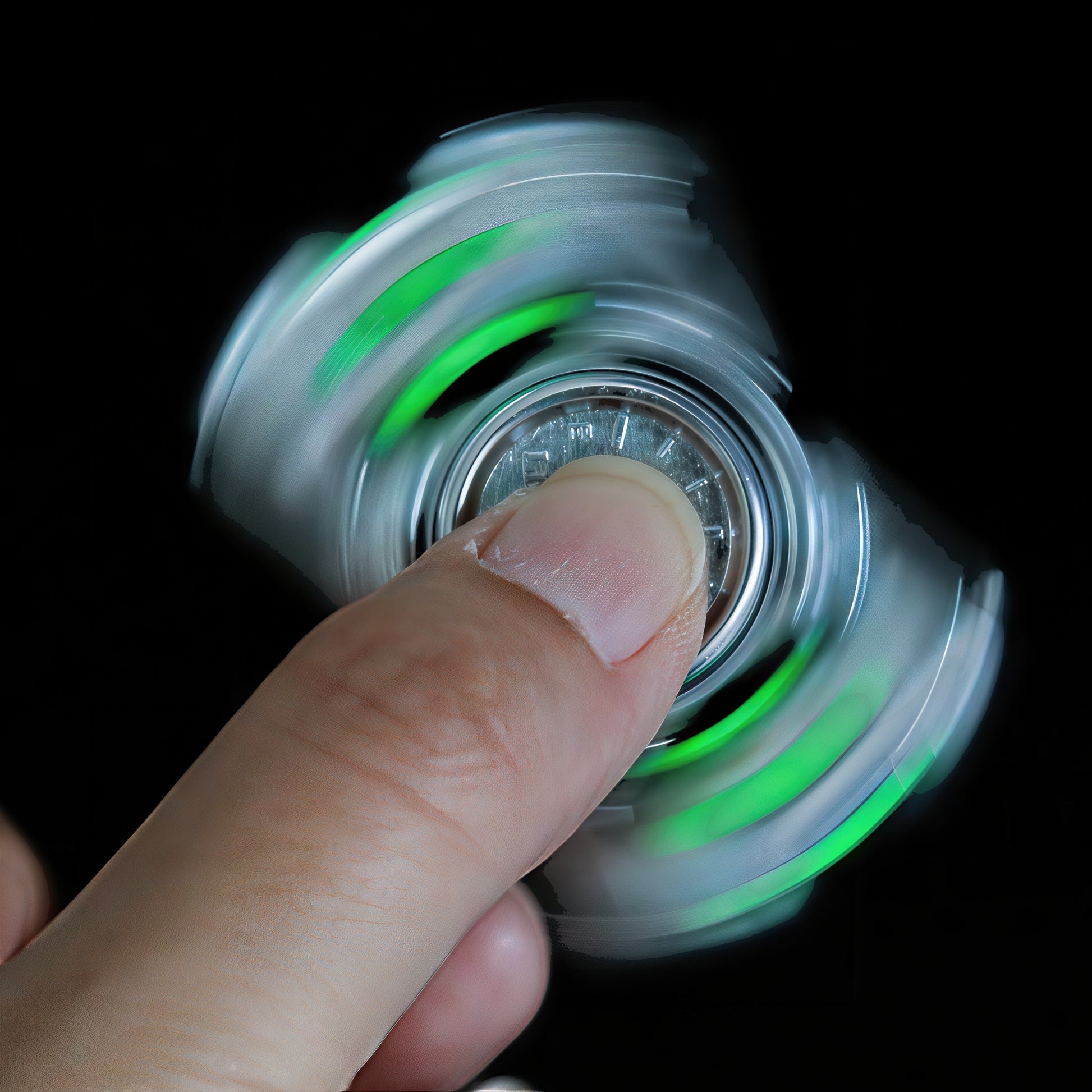 The Curious Mind Luminous Tank Metal Spinner with green glowing accents, held by a finger and spinning.