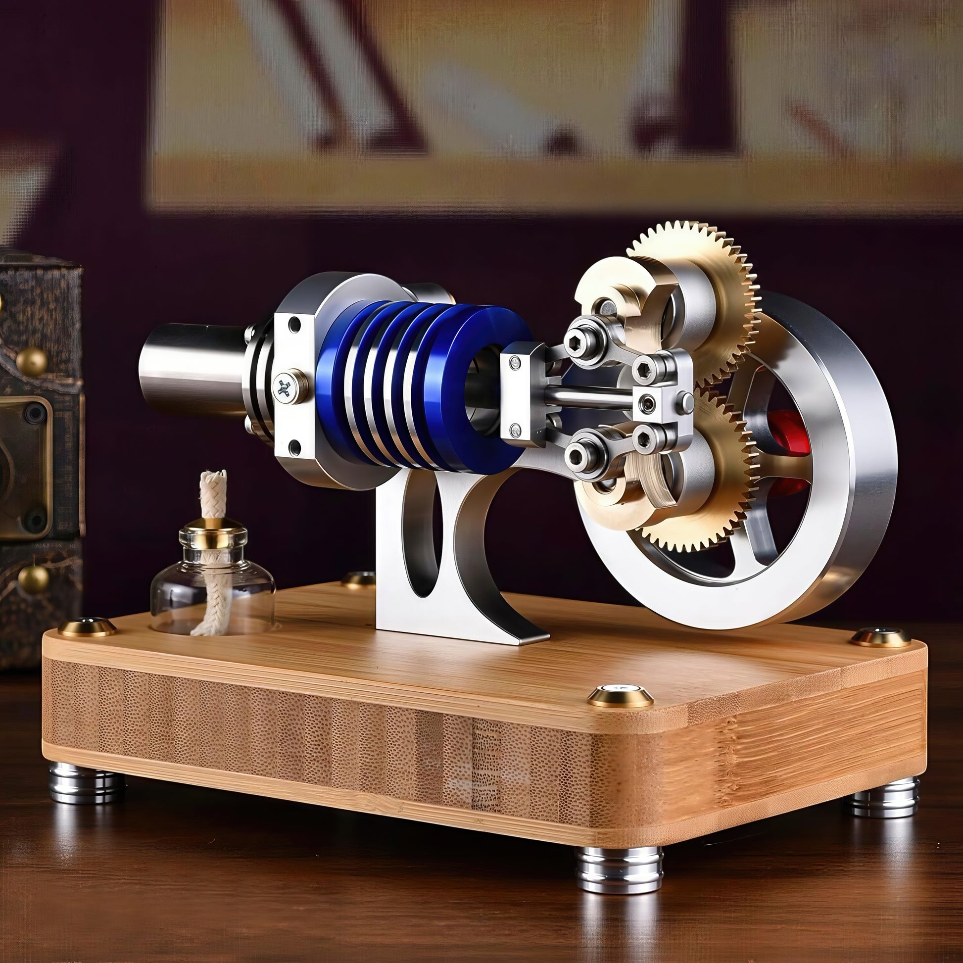 The Curious Mind M20 Stirling Engine model with blue cylinder, metal gears, and wooden base.