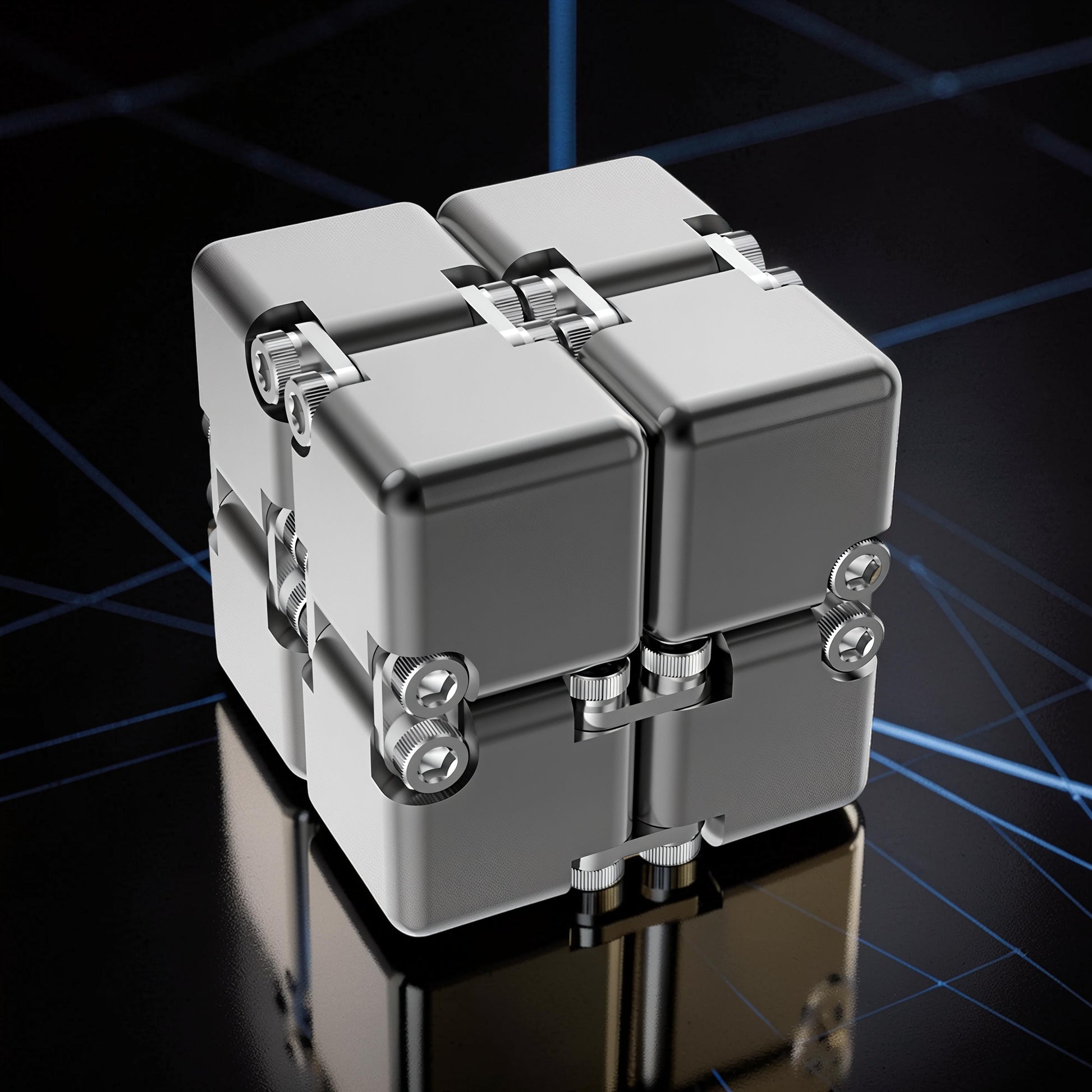The Curious Mind Unlimited Magic Fidget Cube, a compact, metallic silver, magnetic desk toy with a segmented cube design and visible screws.