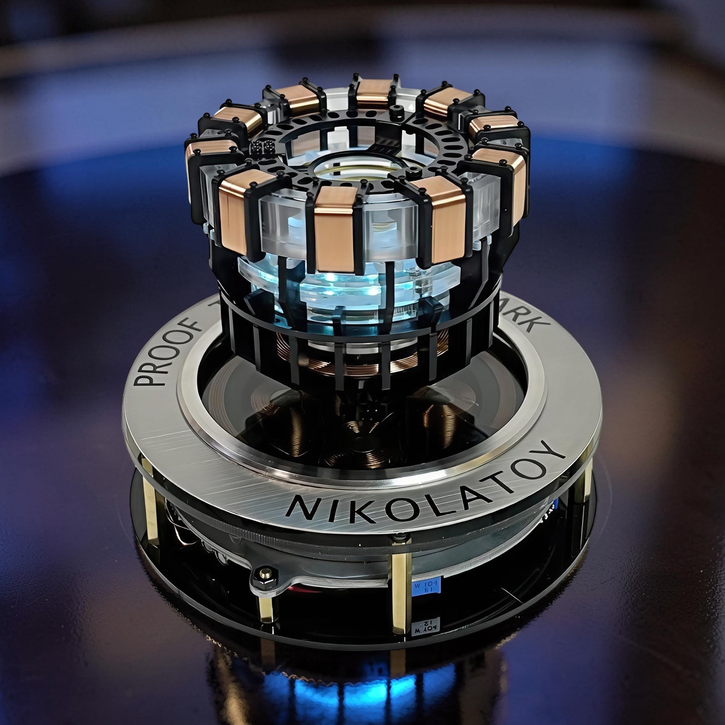 The Curious Mind Maglev Iron Man Ark Reactor Flagship HUD Edition, a metal desk object with blue glowing lights and copper accents.