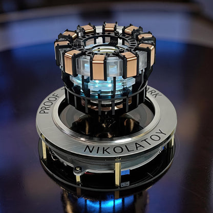 The Curious Mind Maglev Iron Man Ark Reactor Flagship HUD Edition, a metal desk object with blue glowing lights and copper accents.