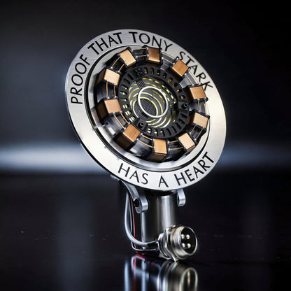 The Curious Mind Maglev Iron Man Ark Reactor Flagship HUD Edition, a metal desk accent with spinning copper coils and engraved text.