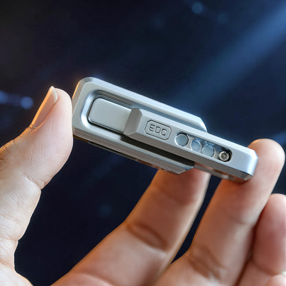 The Curious Mind premium magnetic double push slider fidget toy, made of silver metal with grooved detailing and an 'EDC' logo.