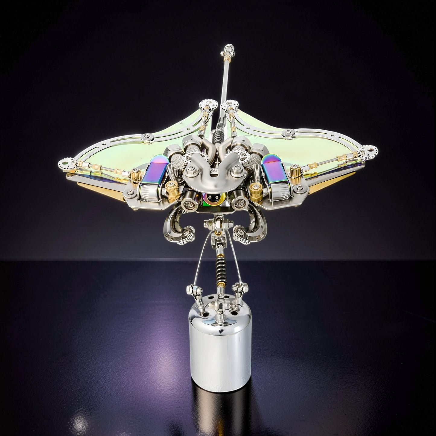 The Curious Mind Manta Ray 3D metal model kit, intricate steampunk design with iridescent wings and metallic details.