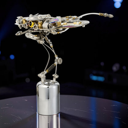 The Curious Mind Manta Ray 3D metal model kit, intricate steampunk design with silver and gold metallic finishes.