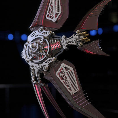 The Curious Mind Mechanical Angelfish 3D metal model kit with intricate gears and red metallic fins.
