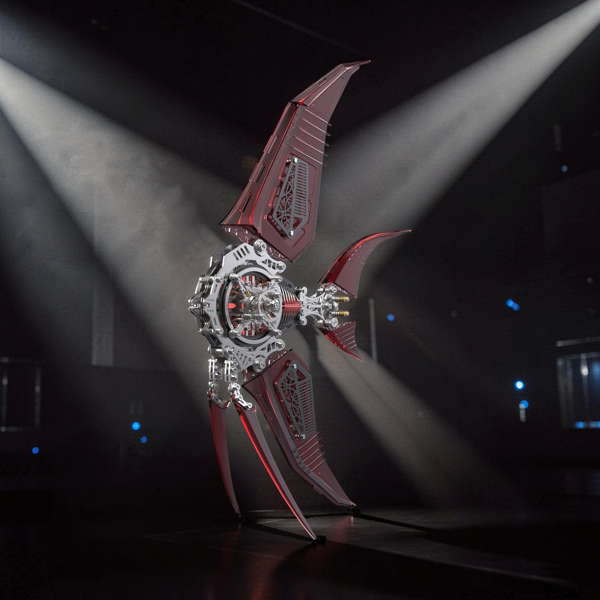 The Curious Mind Mechanical Angelfish 3D metal model kit with red translucent fins and intricate silver metal body.