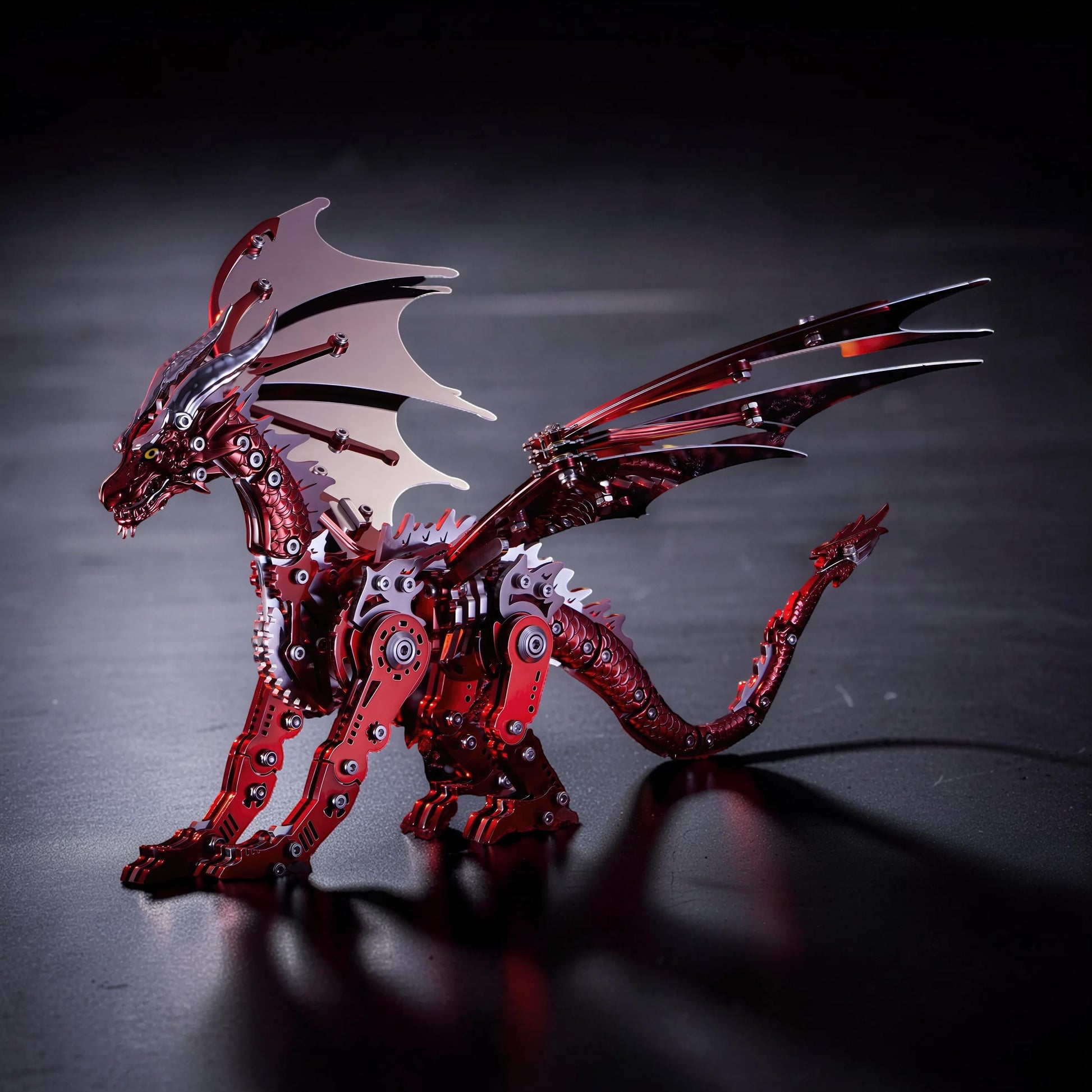 The Curious Mind Pterosaur DIY Kit: a detailed metallic red mechanical dragon model with intricate gears and articulated wings.