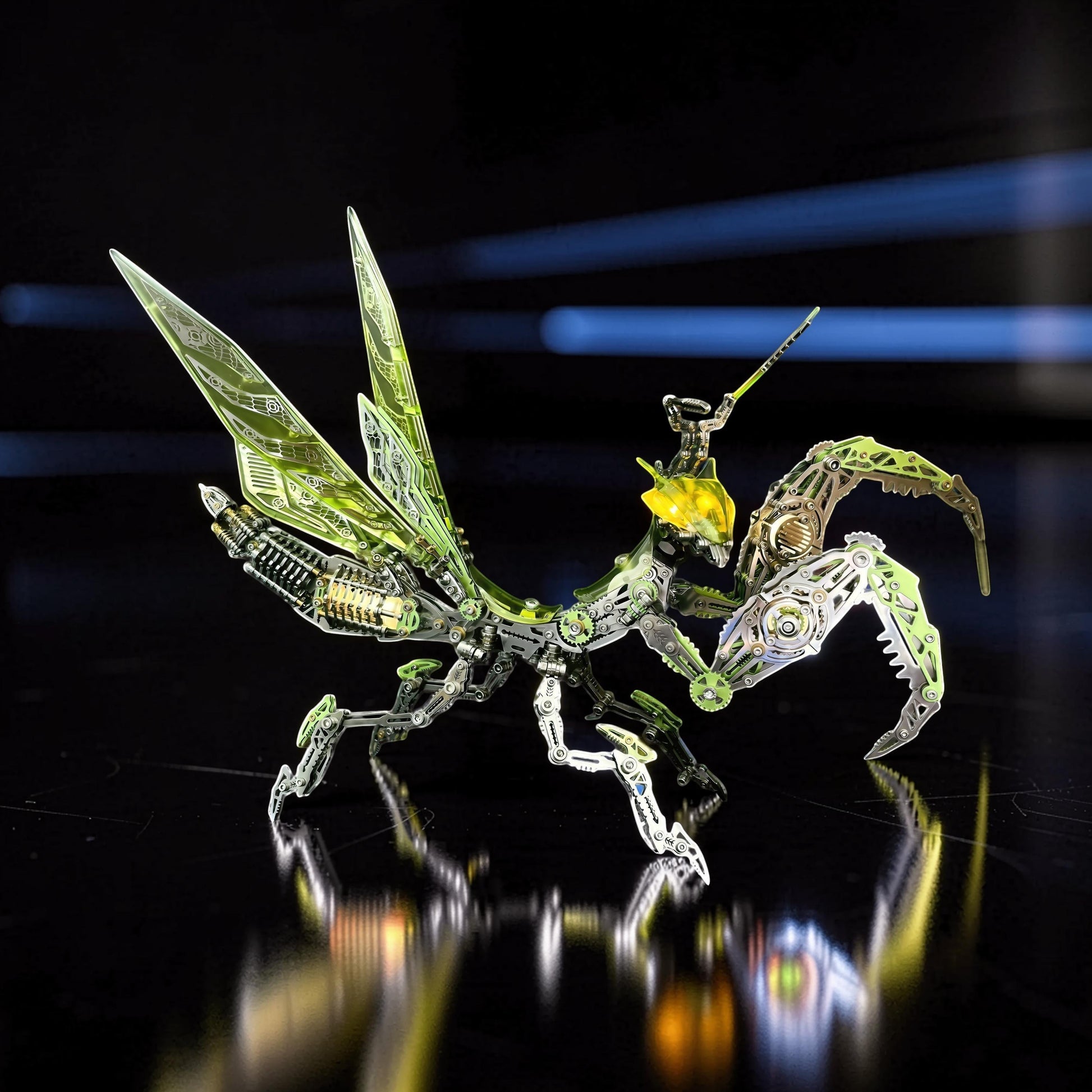 The Curious Mind Mechanical Mantis 3D metal model kit with intricate gears and translucent green wings.