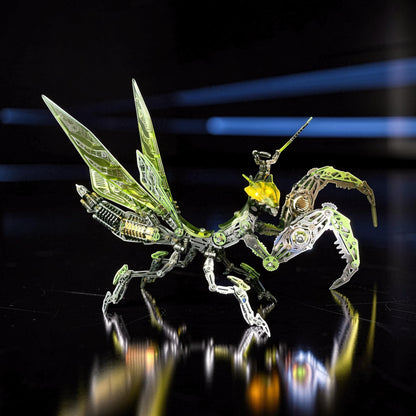 The Curious Mind Mechanical Mantis 3D metal model kit with intricate gears and translucent green wings.