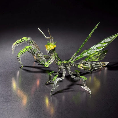 The Curious Mind Mechanical Mantis 3D metal model kit with intricate gears and green translucent accents.