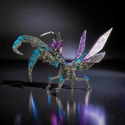The Curious Mind Mechanical Mantis 3D metal model kit with intricate gears, purple translucent wings, and blue accents.