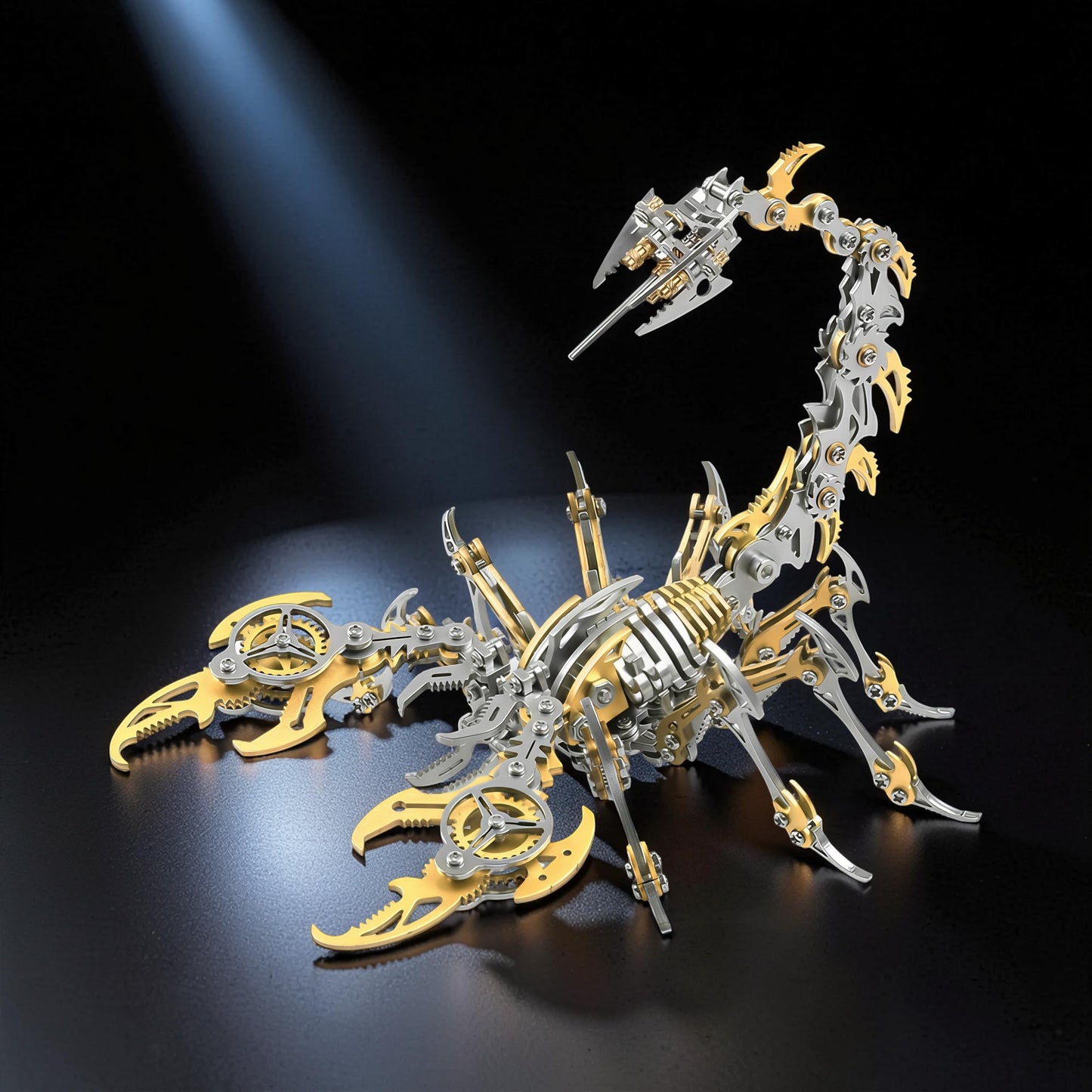 The Curious Mind Mechanical Scorpion 3D metal model kit in gold and silver, featuring intricate gears and articulated legs.