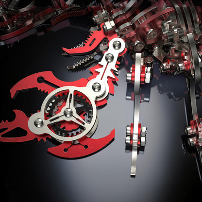 The Curious Mind Mechanical Scorpion 3D metal model kit with intricate gears and red and silver metallic components.