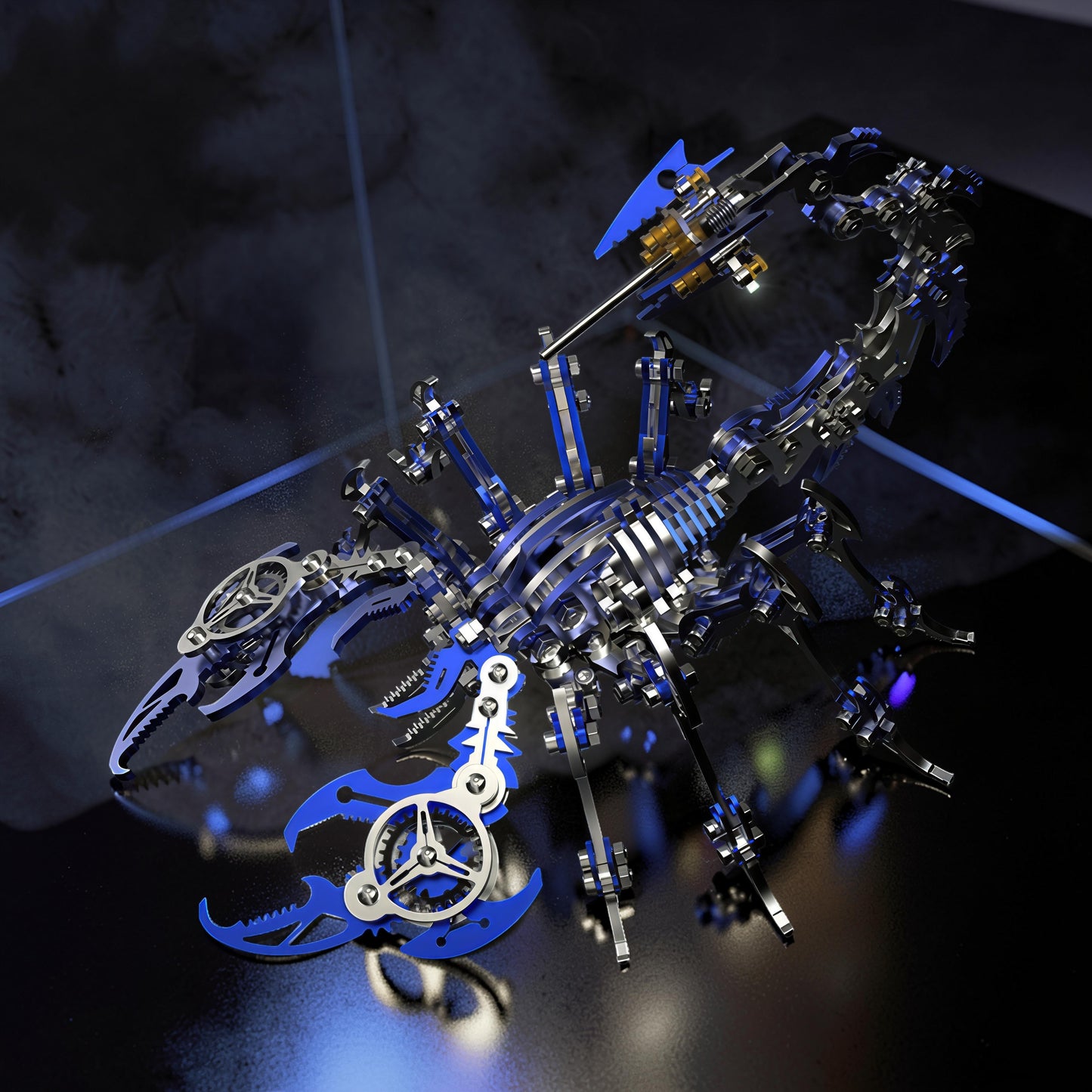 The Curious Mind Mechanical Scorpion 3D metal model kit with blue and silver accents. Intricate gears and articulated legs.