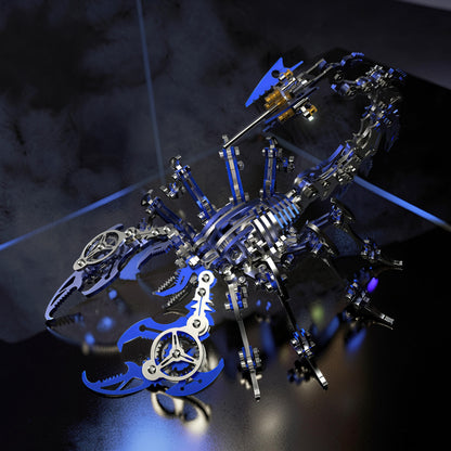 The Curious Mind Mechanical Scorpion 3D metal model kit with blue and silver accents. Intricate gears and articulated legs.