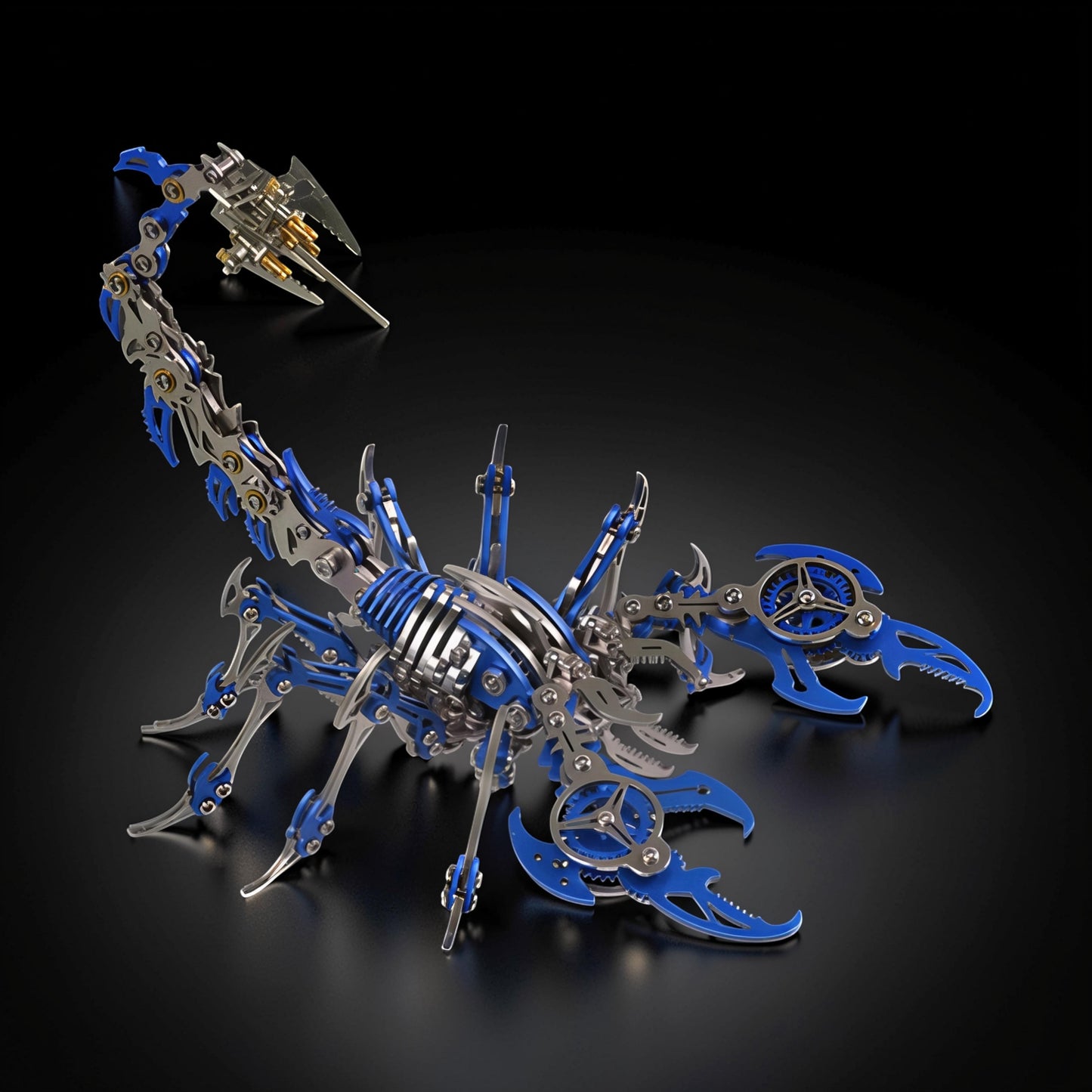 The Curious Mind Mechanical Scorpion 3D metal model kit with blue and silver metal parts, intricate gears, and articulated tail.