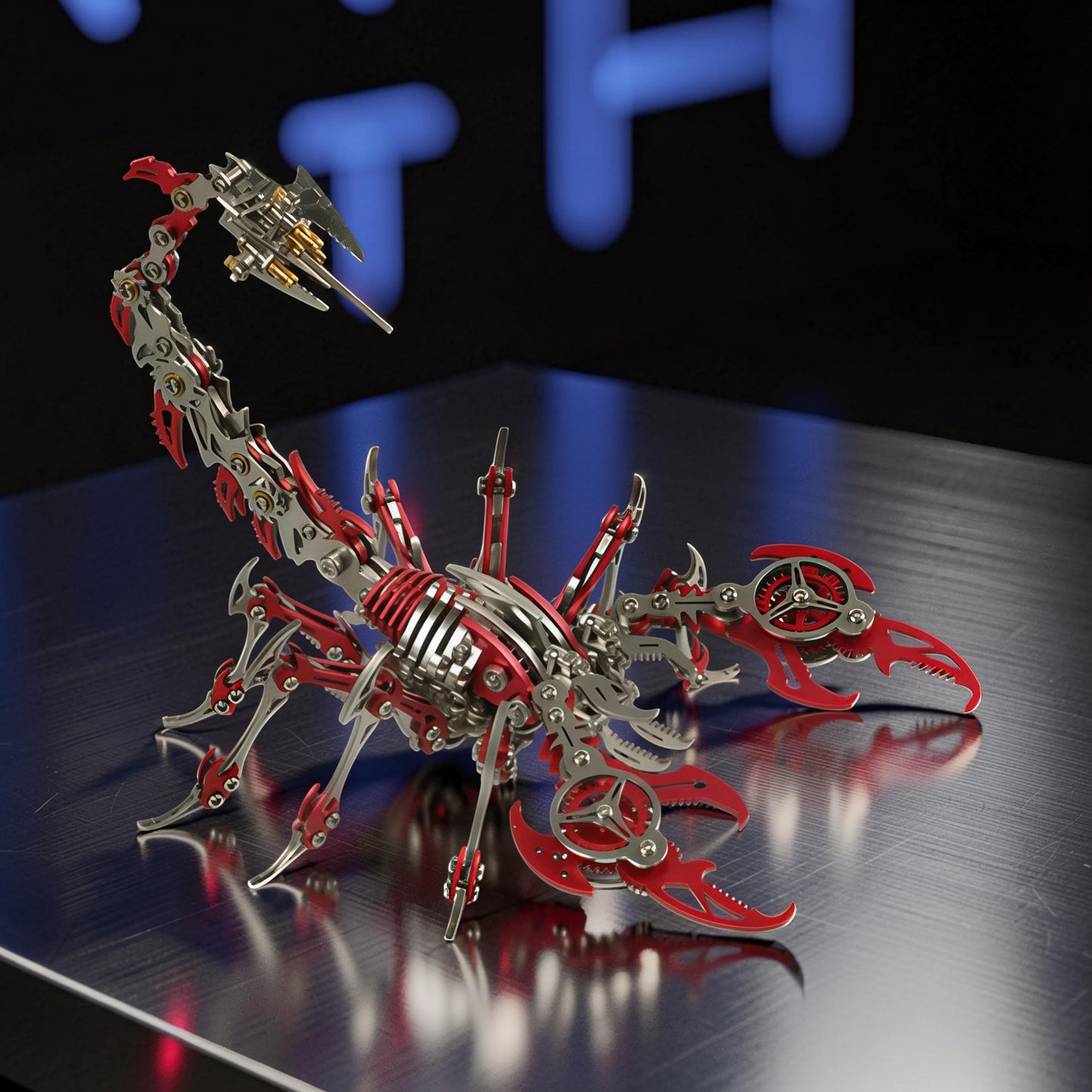 The Curious Mind Mechanical Scorpion 3D metal model kit in silver and red, featuring intricate gears and articulated limbs.