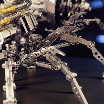 The Curious Mind Mechanical Spider 3D metal model kit with intricate details, springs, and metallic finish. Features articulated legs and a steampunk aesthetic.