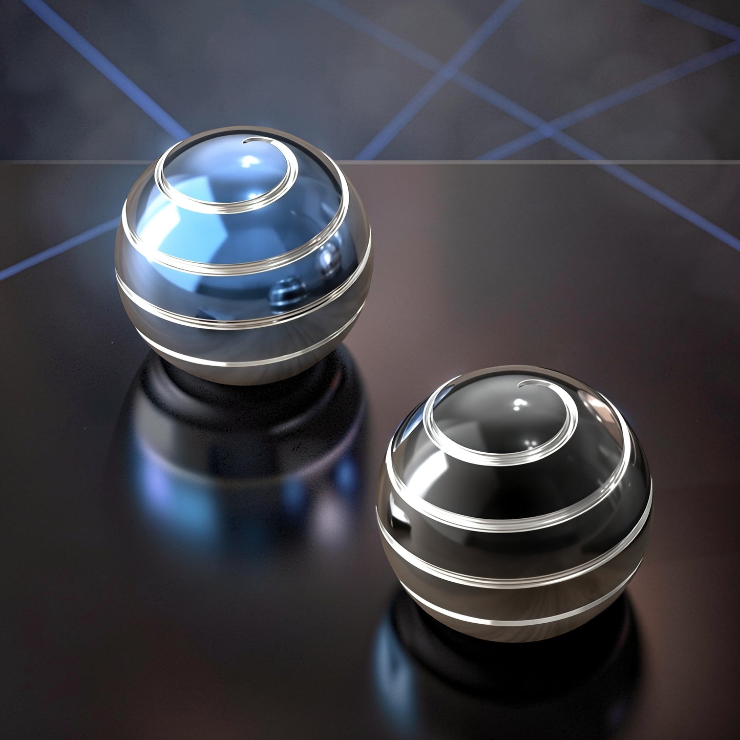 The Curious Mind high-gloss metal desktop stress ball in black and blue, with a spiral design. Weighted for desk fidgeting.