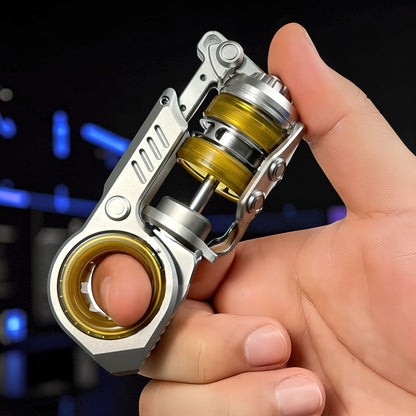 The Curious Mind Fork Ratchet Metal Slider fidget toy with yellow accents, held in a hand.