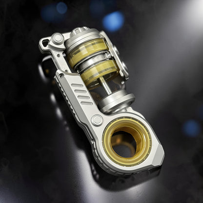 The Curious Mind Fork Ratchet Metal Slider fidget toy with yellow accents and silver metal construction.