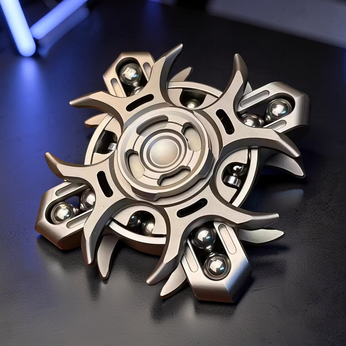 The Curious Mind Oracle Metal EDC Fidget Spinner with intricate design and ball bearings.