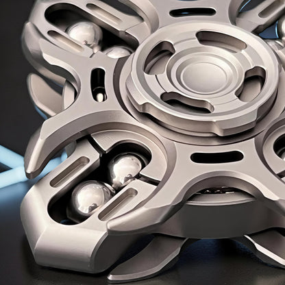 The Curious Mind Oracle Metal EDC Fidget Spinner with smooth tactile action and premium metal finish.