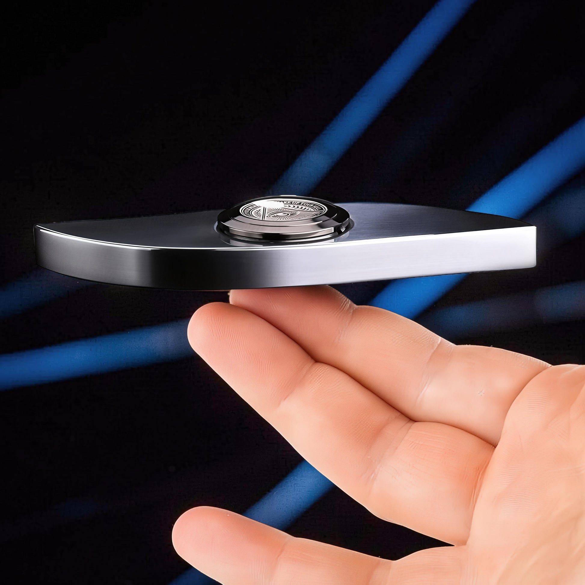 The Curious Mind Power Eye Sensory Spinner, a premium metal EDC fidget toy with a balanced profile and engraved center cap.