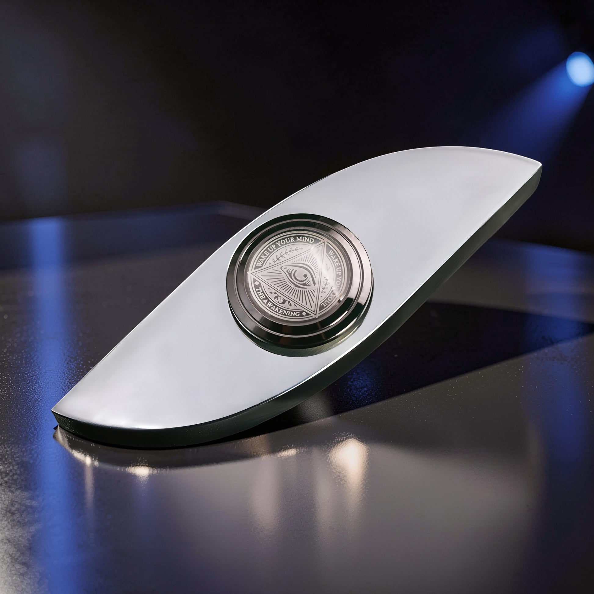 The Curious Mind Power Eye Sensory Spinner, a premium metal fidget toy with an all-seeing eye design.